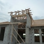 Front entry roof trusses over CMU