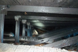 Charring and fire damage to prefabricated wood roof trusses and sheathing